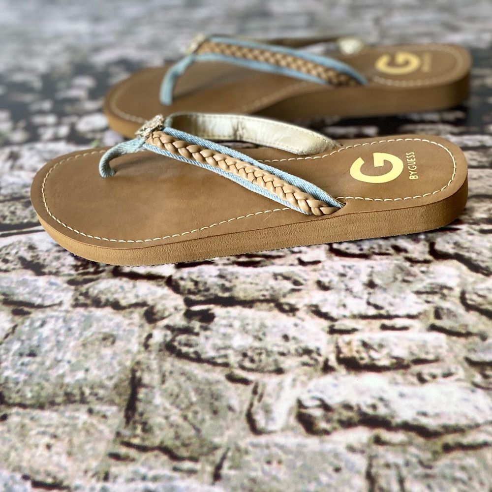 G by Guess size 7 Light Jean and tan flip flop. Gold Heart.